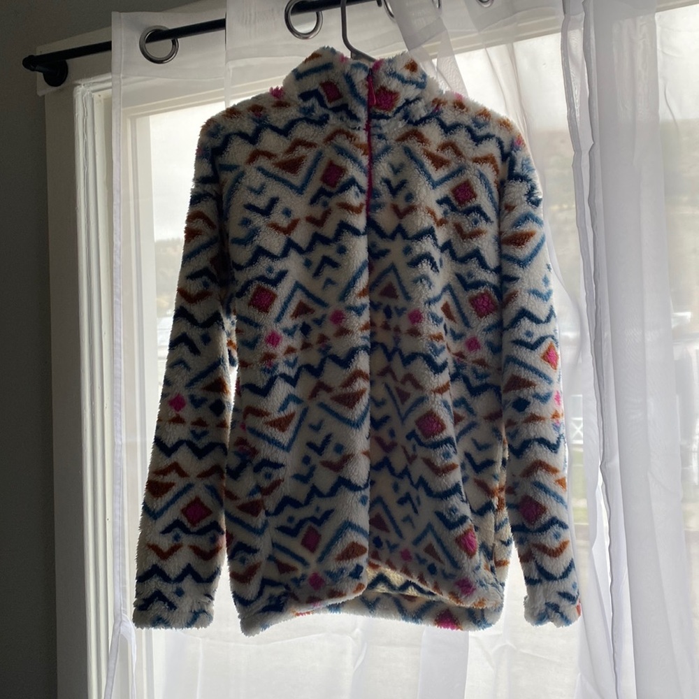 Super fuzzy and cute patterned quarter zip!